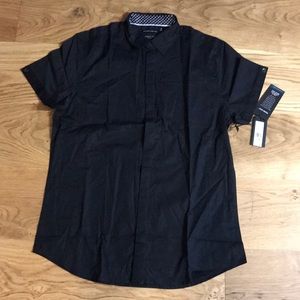 Black short sleeve button down shirt. Size M.